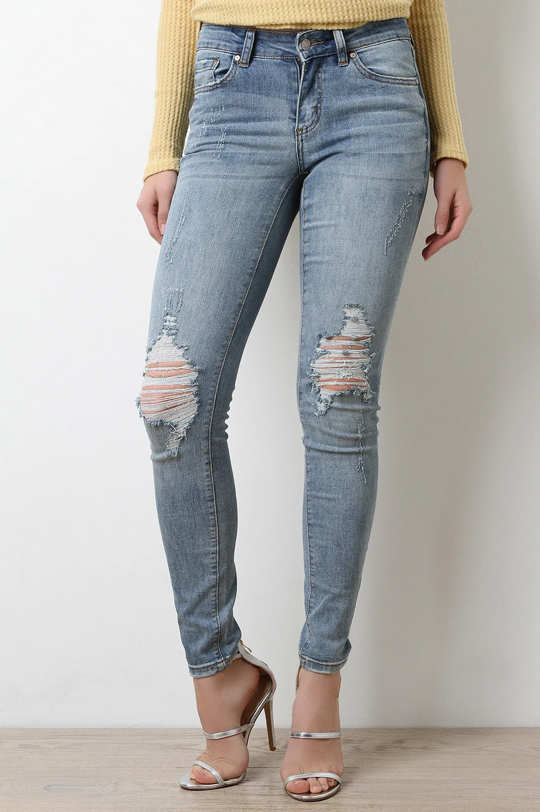 Form Fitting Distressed Knees Skinny Jeans